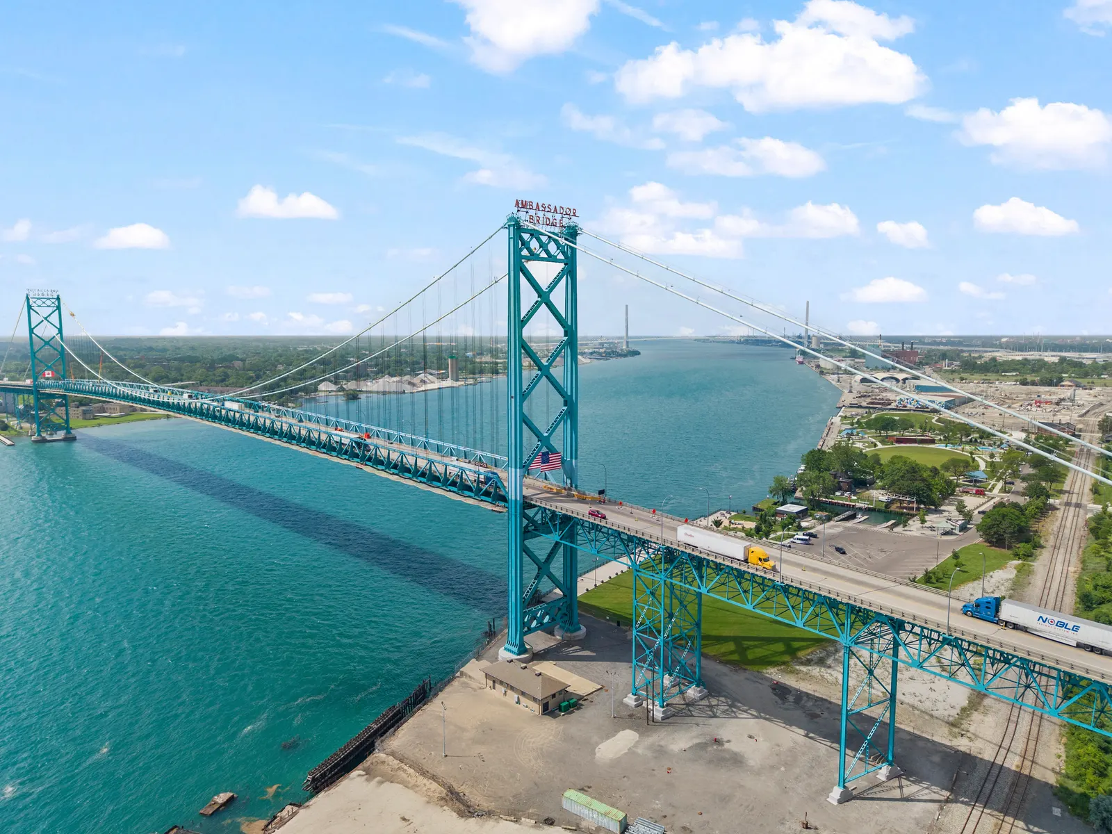 Aerial drone photo of the Ambassador Bridge connecting Detroit and Windsor